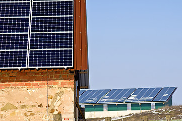 Image showing Solar panel on old barn