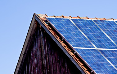 Image showing Solar panel on old barn