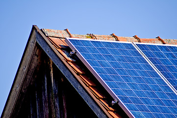 Image showing Solar panel on old barn