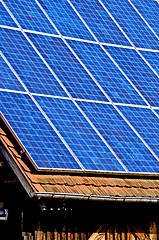 Image showing Solar panel on old barn