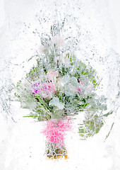 Image showing delicate bouquet of flowers in the ice