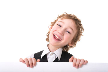 Image showing Little boy is peeking from blank sign