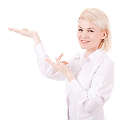 Image showing Happy smiling young business woman showing blank area