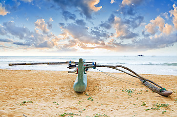 Image showing fishing boat  against sunset background