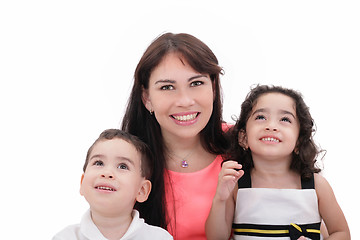 Image showing Mother, son and daughter in a happy embrace on a white backgroun