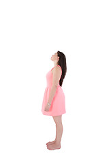 Image showing Portrait of a thinking woman full-length looking away on copyspa
