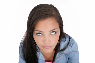 Image showing Sad girl looking at the camera isolated on white