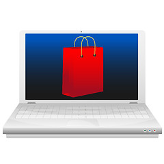 Image showing On line shopping concept. Red shopping bag at laptop screen.