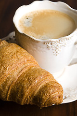 Image showing breakfast with cup of black coffee and croissants