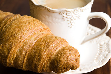 Image showing breakfast with cup of black coffee and croissants