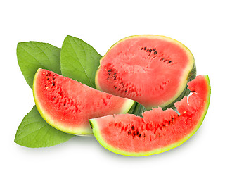 Image showing Fresh red watermelon and green leafs