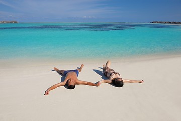 Image showing happy young  couple enjoying summer on beach