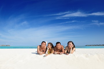 Image showing group of happy young people have fun on bach