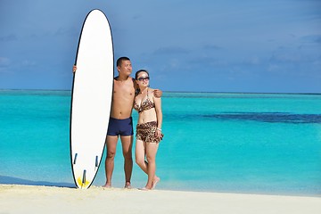 Image showing happy young  couple enjoying summer on beach