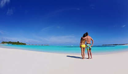 Image showing happy young  couple enjoying summer on beach