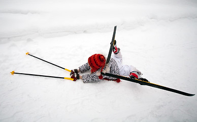 Image showing fallen little skier