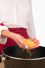 Image showing Noddles into the pot