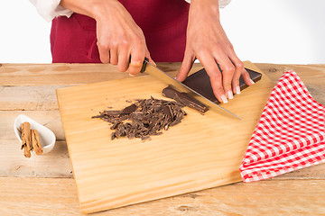 Image showing Chopping dark chocolate