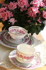 Image showing Cups with roses and Azalea