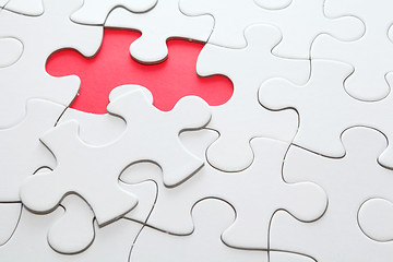 Image showing puzzle with missing red piece