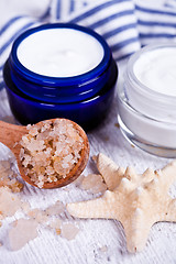 Image showing face cream with sea salt and star