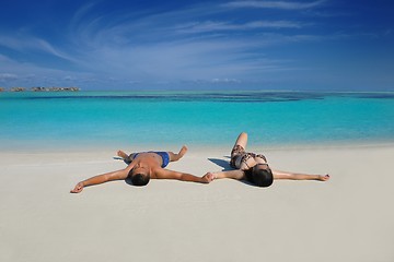 Image showing happy young  couple enjoying summer on beach