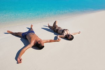 Image showing happy young  couple enjoying summer on beach