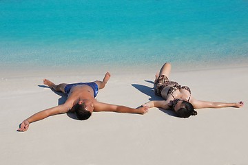 Image showing happy young  couple enjoying summer on beach