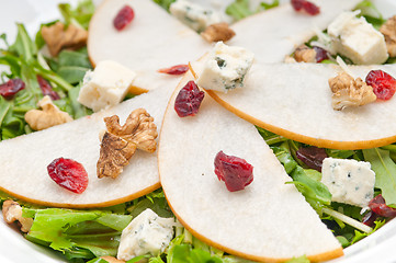 Image showing Fresh pears arugula gorgonzola cheese salad