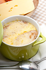 Image showing onion soup with melted cheese and bread on top