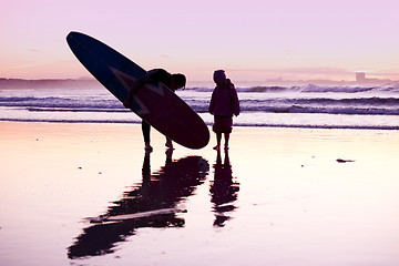 Image showing Female surfer