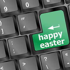 Image showing happy Easter text button on keyboard with soft focus