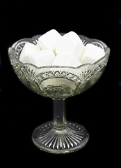 Image showing White sugar in a glass vase