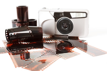 Image showing analog photo camera and color negative films