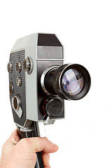 Image showing Old 8mm movie camera in hand