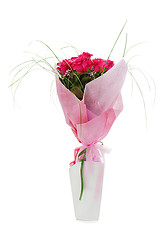 Image showing Colorful flower bouquet from red roses in white vase isolated on