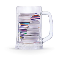 Image showing mug of pile magazines