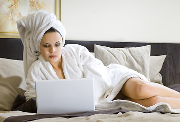 Image showing woman in white bathrobe