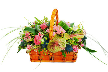 Image showing Flower bouquet arrangement centerpiece in a wicker gift basket i