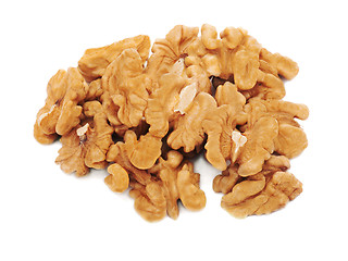 Image showing Heap of fresh shelled walnuts on white background. Close-up.