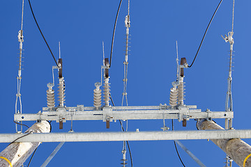 Image showing Electricity disconnector,insulators on a blue sky background