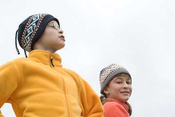 Image showing Kids in Ski Hats and Fuzzy Pullovers