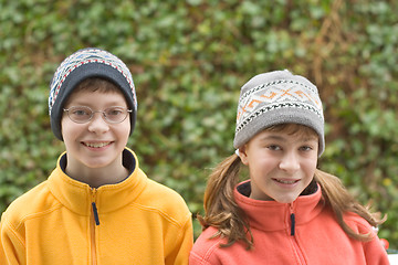 Image showing Kids in Ski Hats and Fuzzy Pullovers