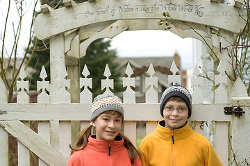 Image showing Kids in Ski Hats and Fuzzy Pullovers