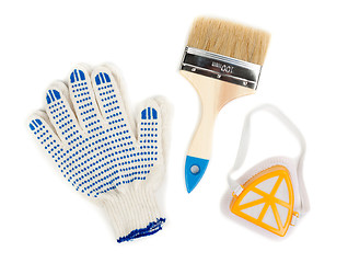 Image showing pair of cotton gloves, paint brush and a dust mask