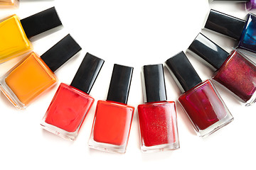 Image showing Coloured nail polish packed in a semicircle