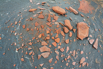 Image showing rusty rocks in the sand