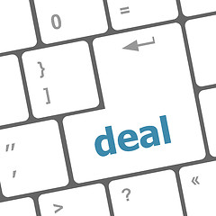 Image showing deal button on keyboard with soft focus