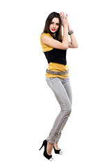 Image showing Woman posing in grey jeans