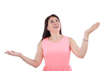 Image showing Shocked and excited woman looking up, isolated on white